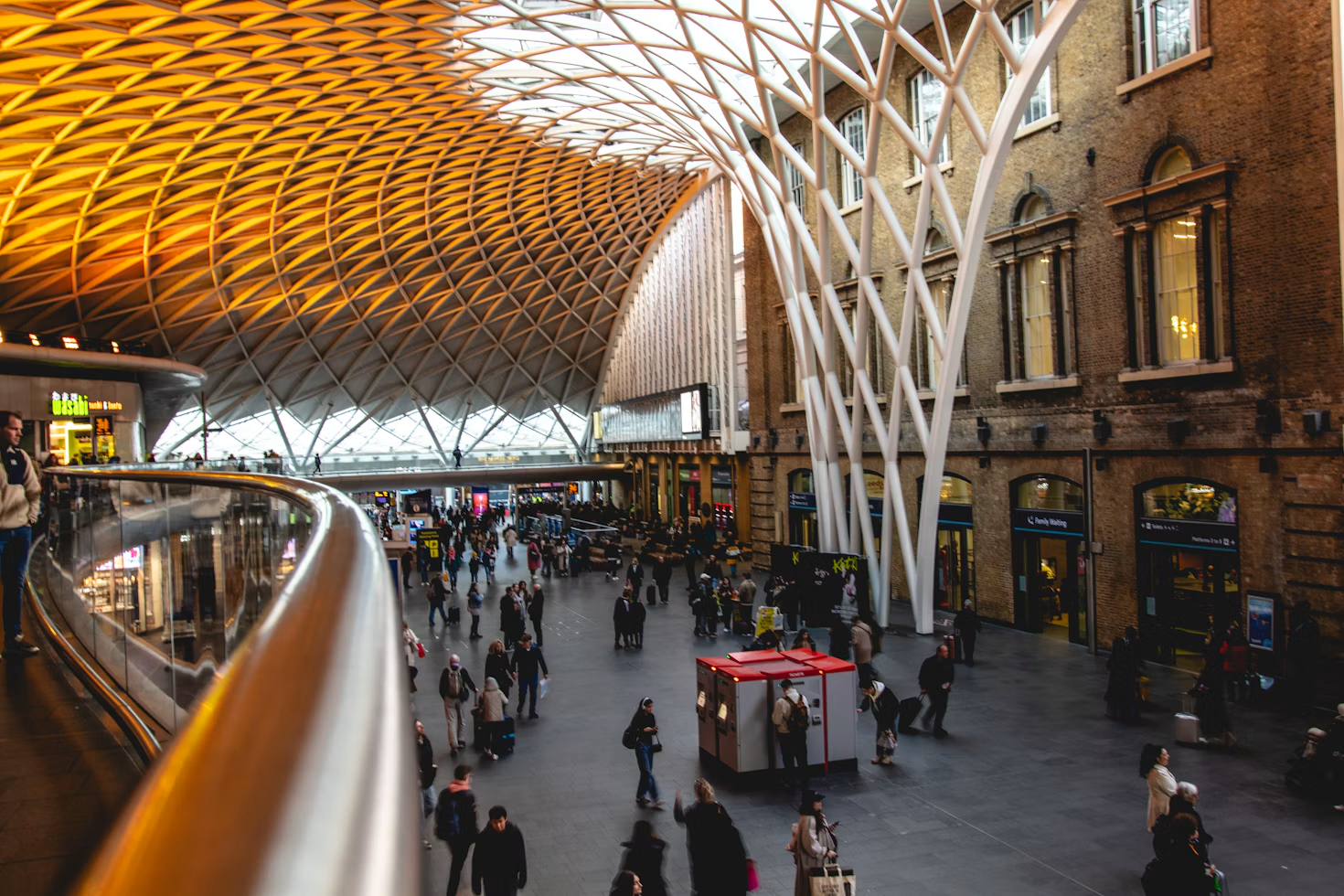 Passengers moving through the concourse at King's Cross railway station